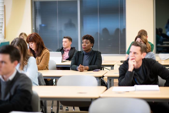 A group of students in a classroom setting.